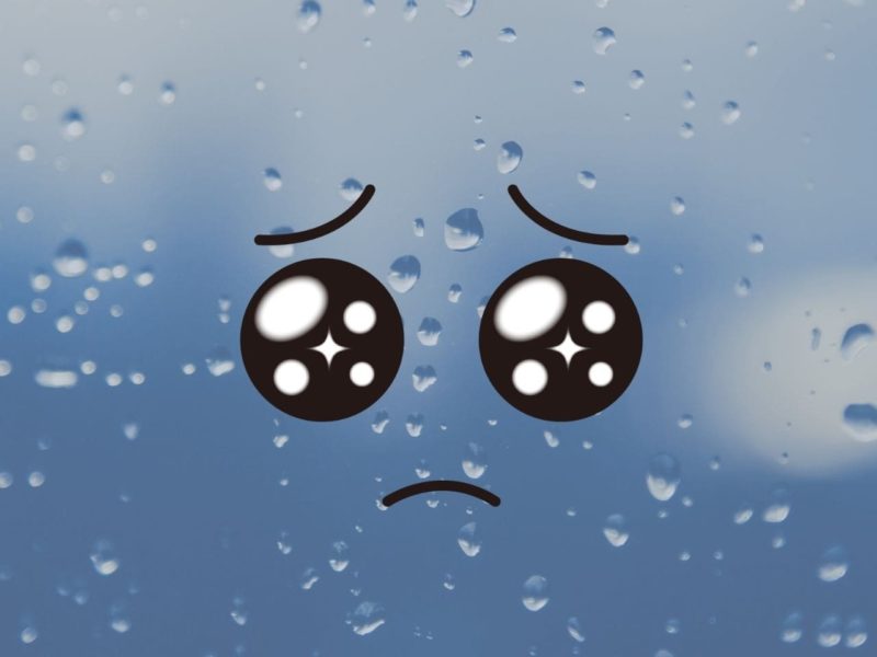 雨と悲しい表情